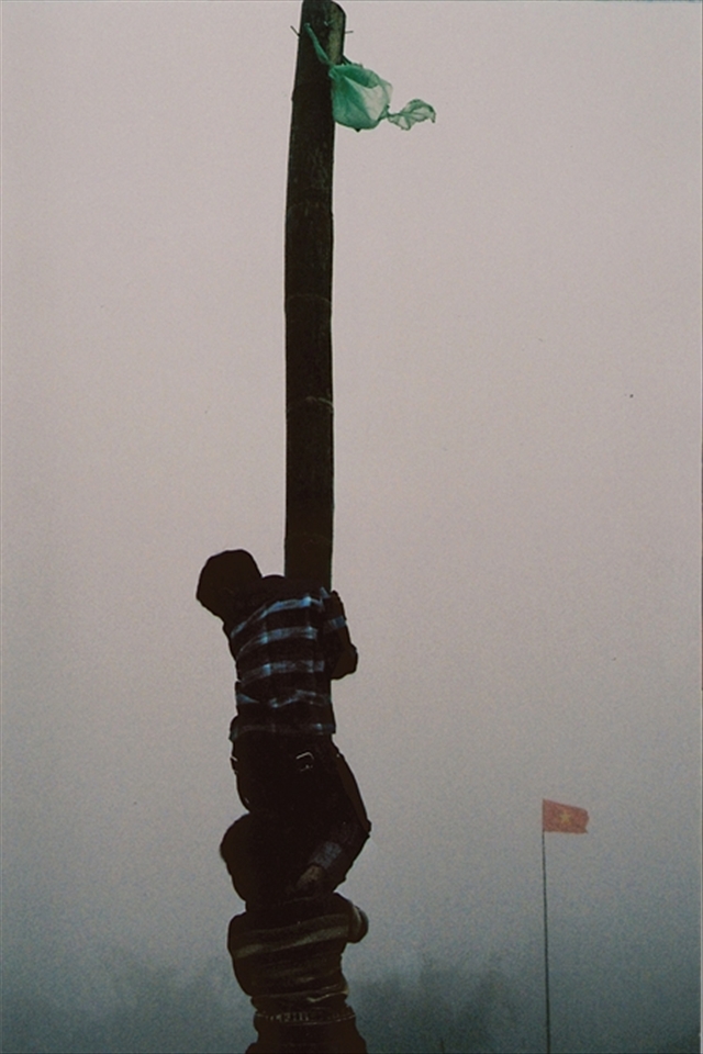 Once we arrive there is an annual festival taking place, where people from surrounding villages join to participate in wholesome games, such as this one where the aim is to reach the flag at the top of a pole.