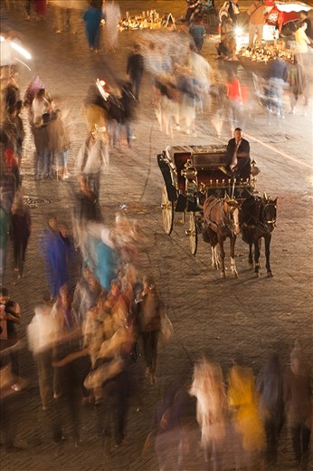 The Nerve-Centre of the old walled town of Marrakesh where people gathers for eating, shopping, playing and entertaining . .