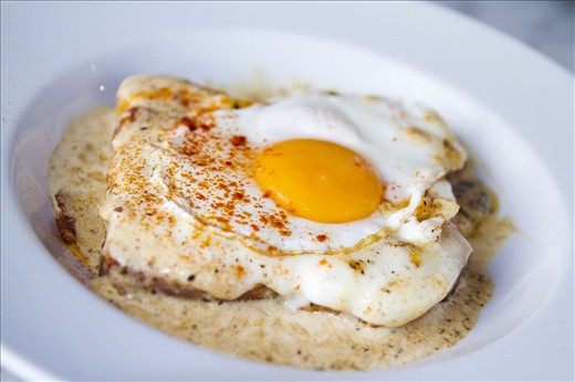 The silky yolk over the soft, luxurious gruyere cheese and ham