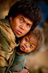 Protecting his son from Westerners that they have never been seen before.: by hmathewson, Views[264]