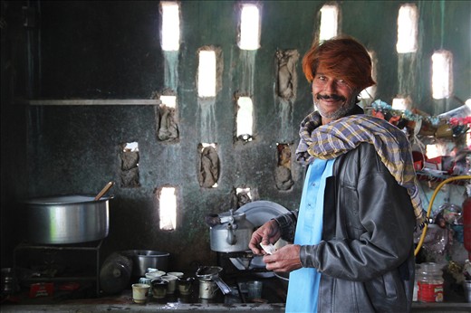 To provide for their families, men are seem doing menial jobs.