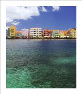 The colorful waterfront of Willemstad, Curacao’s capital city, showcases the classic pastel colors of the Dutch Caribbean. The two main tourist districts in Willemstad are Punda and Otrabanda, linked together by a floating pontoon bridge, which swings open to allow ships to enter the harbor.: by hoffeman, Views[1009]