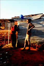 These is a photo of two boys having a chat and sharing jokes: by holidayfun, Views[217]