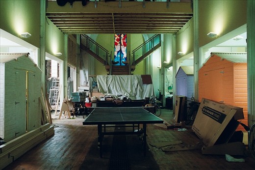 
What would have originally been the church's nave is now a games room for Adrian's two boys. The purpose built shed's hold all manner of things, including a substantial collection of Warhammer models. In a church that features stained glass windows painted by the likes of Burne-Jones, the modern one feels somewhat out of place. 