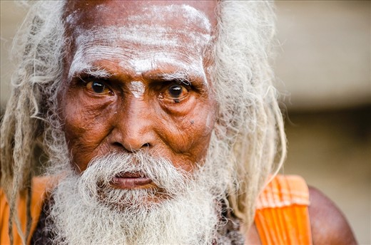 A portrait of a Sādhu at the Annamalaiyar Temple in Tamil Nadu, India.

The composition in this portrait is quite a tight crop as this Sādhu’s weathered face and tired eyes said it all. The age-old saying ‘the eyes are the window to the soul’ definitely ring true in this frame. I see so much innocence and kindness in this old man’s eyes.