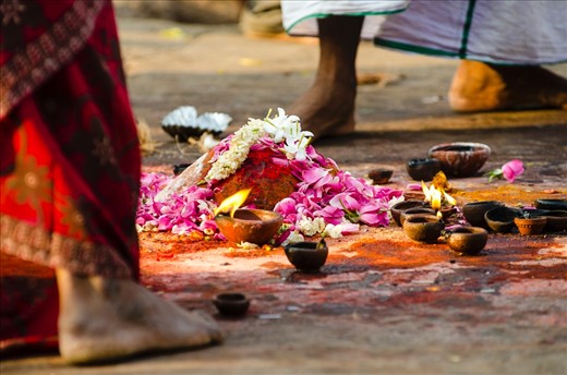 Taken outside of the Annamalaiyar Temple in Tamal Nadu, India. This scene was apart of a Hindu ceremony where holy men would lay down offerings to the deity Shiva. What caught my eye from this simple scene was how the evening glow of the sun was bringing all of these colours to life.