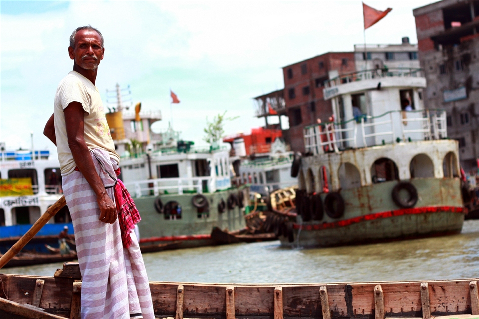 Buriganga rvr./ Bangladesh/ the solo traveller of the river awaits your call