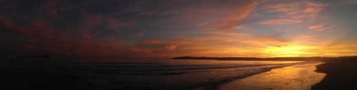 St. Helier beach with the castle just visible to the left.