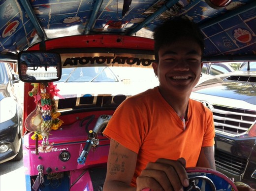 Kap, our sweet tuk tuk driver.