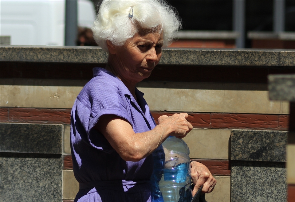 The old lady can carry only one bottle so she'll be back here tomorrow.