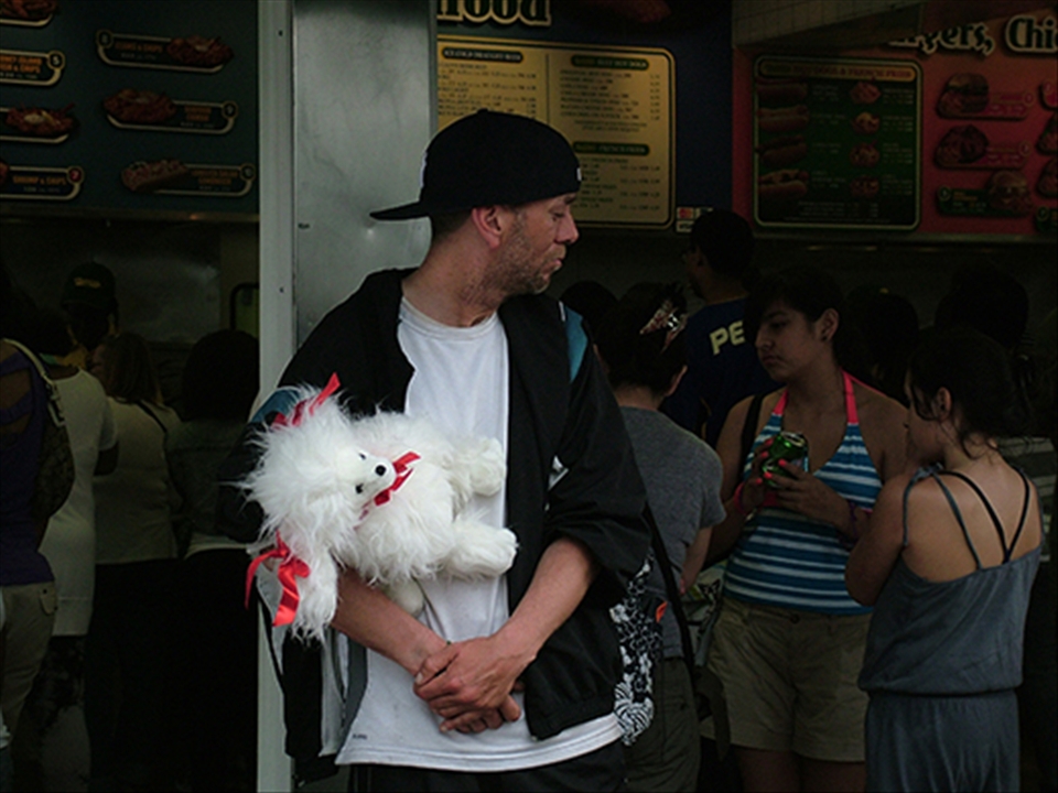 A man with his pet doll