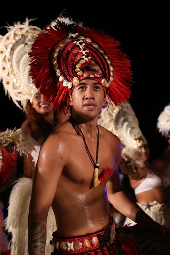The moment of stepping on stage. The tension accumulated in 5 months of hard and coordinated practice of 25 drummers, 30 singers and 120 dancers bursts out in an incredibly powerful and energetic performance. Every year 15 different teams compete with their original show to win the Heiva and make their family and community proud.