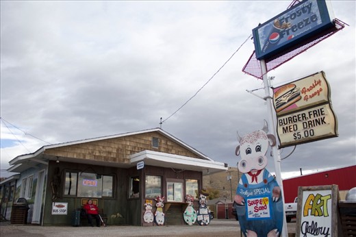 Kali Star waits for her Trailways bus outside the Frosty Freeze in Drummond, Mont. on Oct. 19, 2012. The diner opened May 24, 1962 and is one of the town’s enduring businesses. 