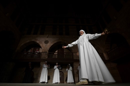 A Tanora dancer performs a SUFI dance during the Cairo festival  for religious SUFI music.this festival is held once a year inside the Obet El Ghoury ancient theater which was built 1300 years ago. 