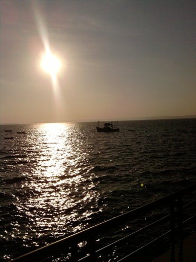 A lone fishing boat in the seas of Goa