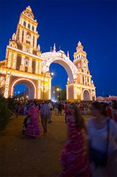 The big portal of Barrio de los Remedios, from this way every day pedestrians, horses and carriages pass to join the feria.
Monday night, take place the inauguration of Feria, all the people wait together the official beginning of the celebration, enshrined by the ignition of the 22.000 bulbs that decorate the portal.
: by imbez, Views[475]