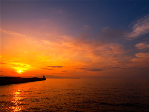 Aomori is at it's most stunning at sunset, when the sun sets by the lighthouse
