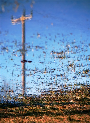 The infrastructure isn't always a beautiful sight, but an alternative perspecitve can be. Even flooded fields can reflect something interesting. 