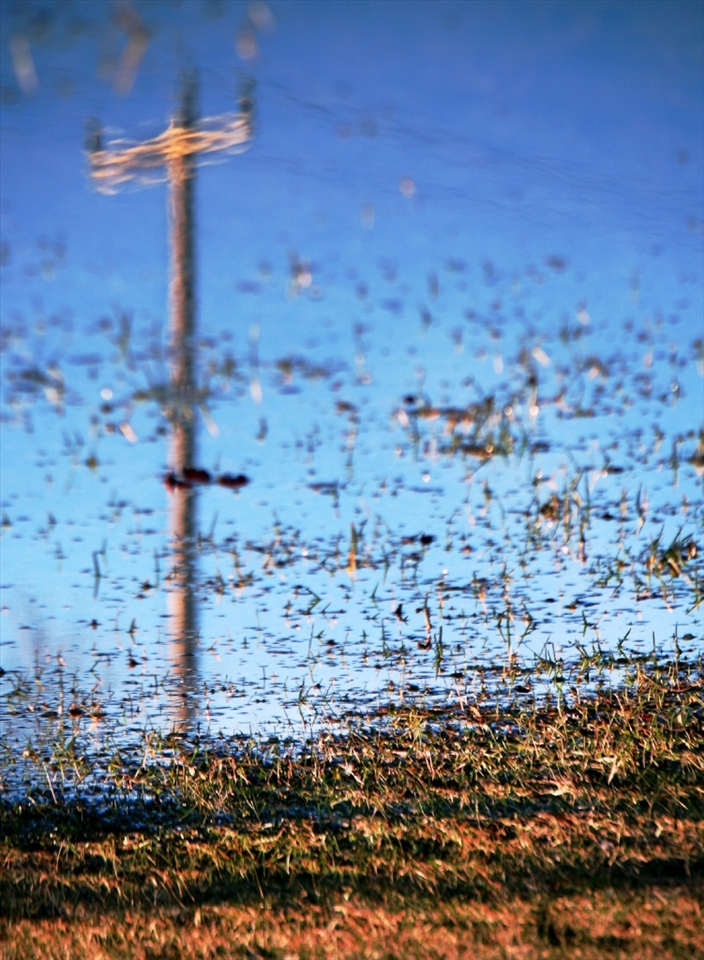 The infrastructure isn't always a beautiful sight, but an alternative perspecitve can be. Even flooded fields can reflect something interesting. 