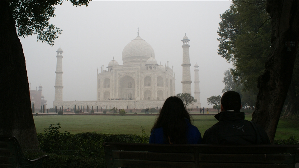 My cousins contemplating the great Taj Mahal.