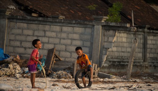 17:38 The children play in the late afternoon sun waiting for their parents to come home. It’s amazing how much fun children can have without a television. Just an old bike tube and a bra washed up on the beach, is all they need to keep a smile on their face and out of trouble.