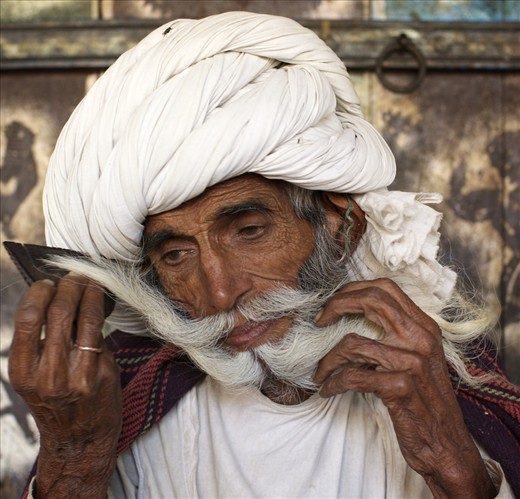 For Rabari men the moustache is a very important asset as this gives them status