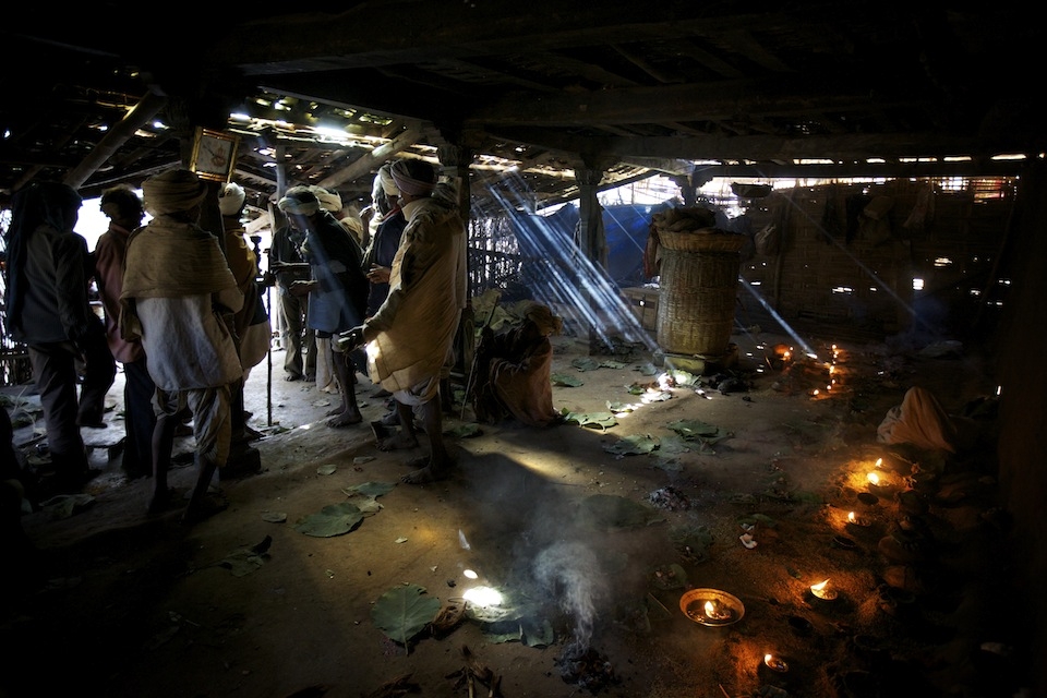 Tribal elders leaving after a monthly meeting where they discussed local issues