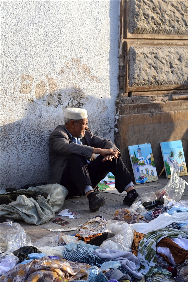 In the market of the capital, a man sitting at the end of the day, or maybe you 