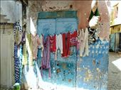 Colorful laundry brightens up the crumbling blue alley of Tangier, Morocco: by inta, Views[328]