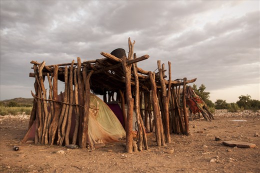 Lured by modern amenities, Himbas are struggling to keep their traditions. Many don't build huts anymore, using tents bought in town, lightly shaded with twigs.