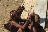Even in mourning, Himba women pay attention to their appearance. Nowadays they use ready-made extensions clipped with clay, instead of hair collected from the men, as they used to do in the past. : by intotheworld, Views[890]