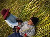 Local children having fun under the sun on a floating island in lake Titicaca: by ioanna_papouli, Views[342]
