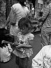 Children offer candles and ‘sinug’ (dance veneration) in exchange for few peso. : by iolemarie, Views[278]