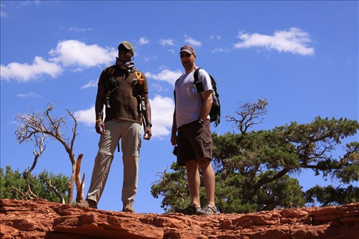 A portrait of two friends enamored by the Grand Canyon scenery