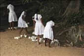 Girls putting their shoes on after praying at the old Polonnaruwa religious site: by ireneb, Views[729]