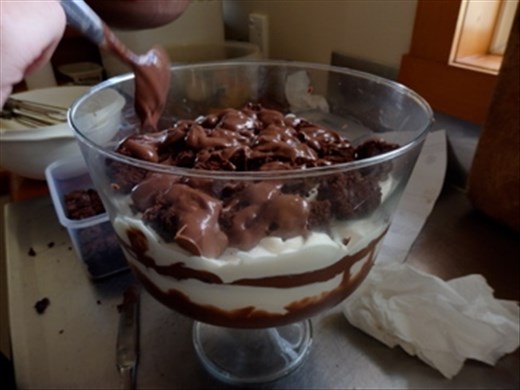 The melted chocolate cements the brownie layers to prevent it falling apart