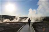 Yellowstone National Park, Wyoming. A man walks into geyser steam as the sun prepares to disappear behind the hill tops: by isabelrodriguez962, Views[347]