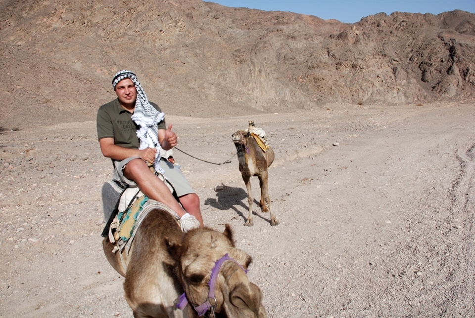 The poor camel it carries the weight on his sholders, but the guy enjoys every moment of the ride. You need to find and enjoy each moment of your life.