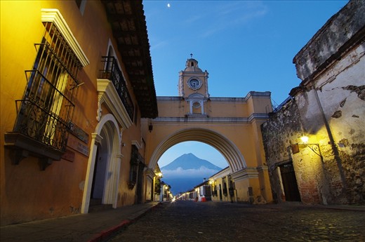 Antigua, historic capital of Guatemala is its cultural center. Here, the Arco de Santa Catalina was built to allow nuns to pass from one building to the next as the convent population exploded.