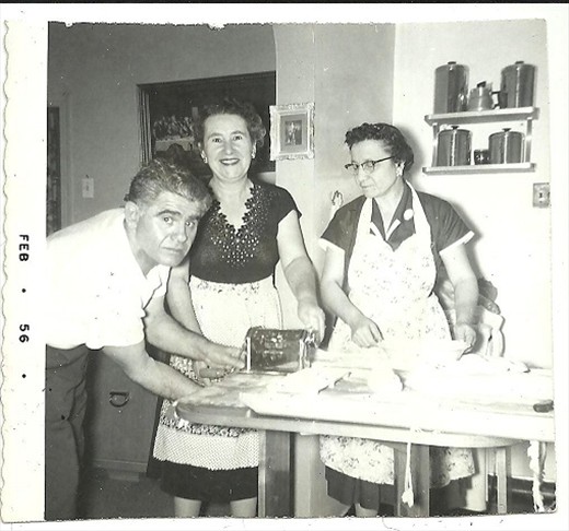 My grandparents making pasta on the same table I used in photo 1 & 2.