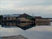 Sunny afternoon in floating houses, traditional houses of Palangkaraya, the capital city of Central Kalimantan, Indonesia. The shadow of house which is reflected by the river makes a modest home was appealing.: by itsindonesia, Views[710]