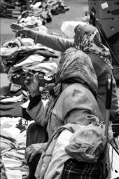 A woman showing the other woman were is a better place to sell goods: by ivana, Views[248]