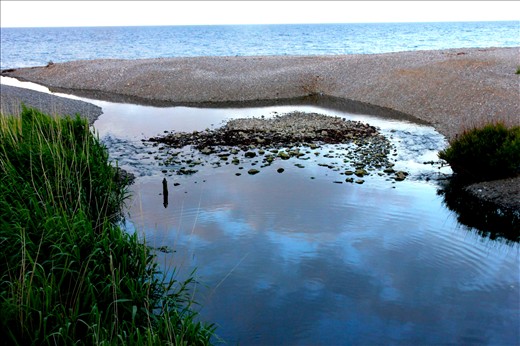 A meeting point between two waters. On Killiney beach in South Dublin.