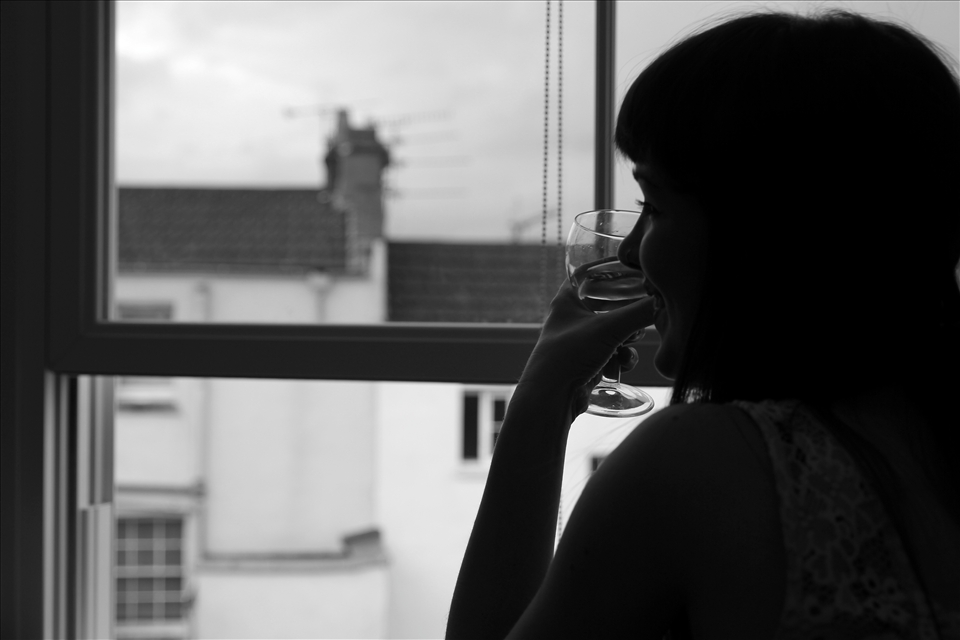 A Glass of wine indoors, hiding from what we call summer. 