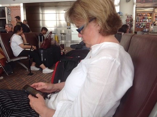 Anna in the airport on our way to Germany