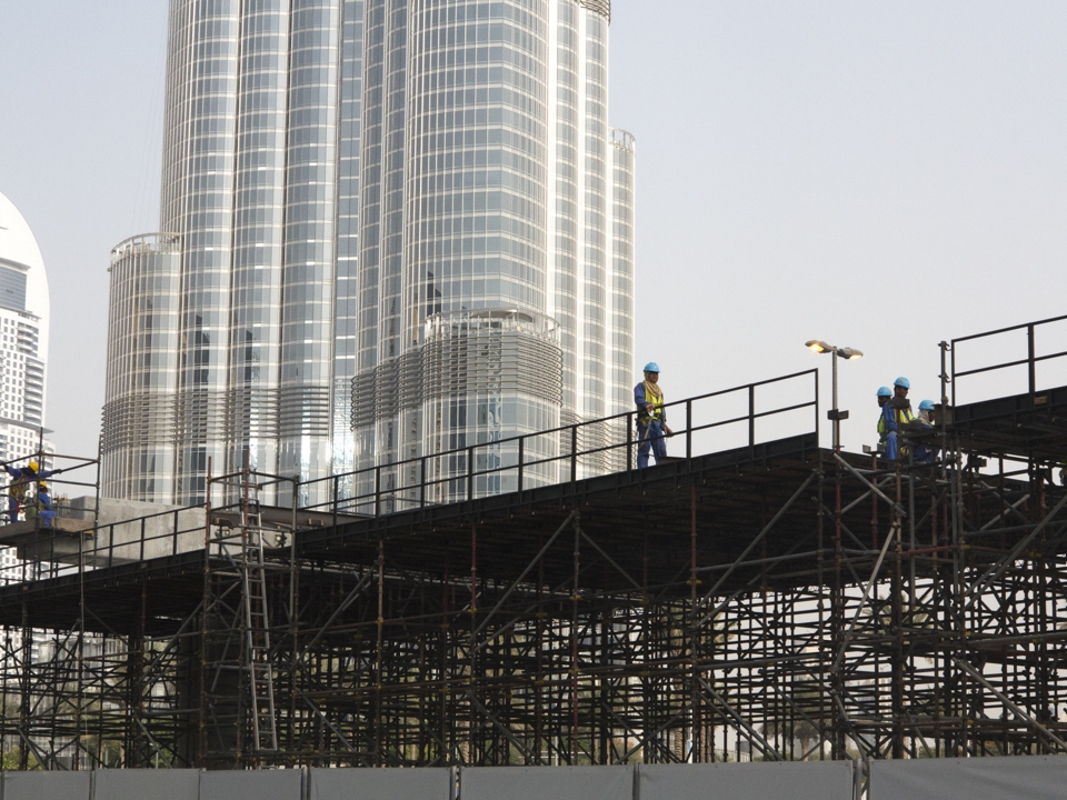 Construction of walkway with Burj Khalifa in the background                     
