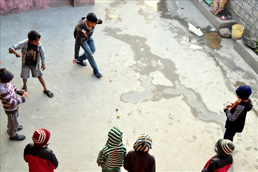 As soon as school finished for the day, the boys would be in the courtyard playing with their spinning tops. 