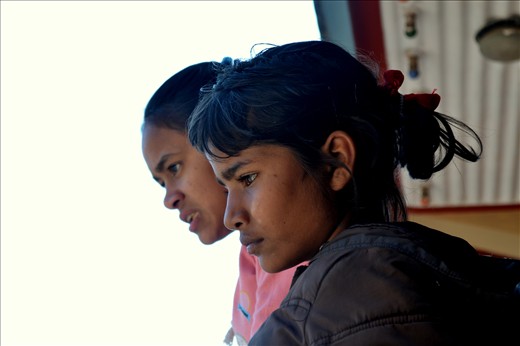 There was always life and people around the Happy Home. Often the girls would stand on the balcony and gaze down at the happenings in the courtyard. This is Jyoti (in the back) and Dhanmaya, enjoying the events of the day. 