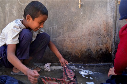 I know it's frowned upon to have favourites amongst the kids, but Nishan was definitely a favourite. He was always smiling, even when doing his weekly washing chores. 