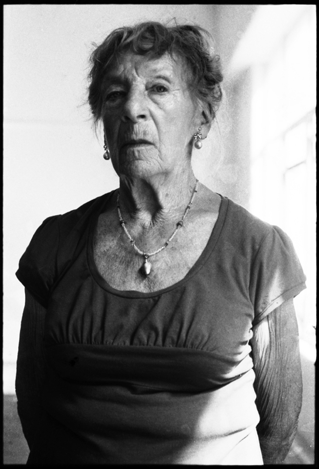 The third is the owner of these hands. Her name is Joan, “Like the one on the firing stick”, as she said at our very first encounter. She was the elevator operator of the Nicholas Building for thirty-six years, the last of her kind. 